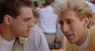 A young Jim Carrey and a blonde, even younger Nicolas Cage have a lunchtime discussion.