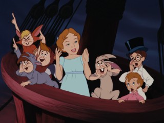 Wendy, John, Michael, and the Lost Boys cheer on as Peter Pan stands up to Captain Hook.