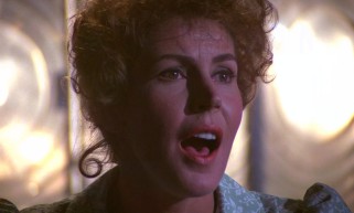 Nora (Helen Reddy) sings the Oscar-nominated "Candle on the Water" from up in her lighthouse.