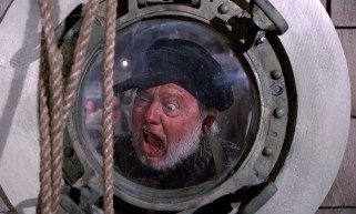A dragon! A dragon! Lampie (Mickey Rooney) swears he saw a dragon!