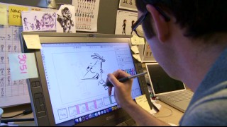 Look closely or you'll miss this quick, unadvertised look at an animator drawing on his computer screen!