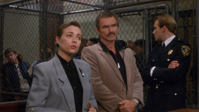 Public defender Jennifer Hudson (Theresa Russell) gladly represents Joe Paris (Burt Reynolds), a suspended Boston cop accused of first degree murder in "Physical Evidence."