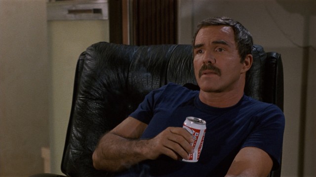 Beer-swilling suspended Boston cop Joe Paris (Burt Reynolds) finds himself in a mess in "Physical Evidence."
