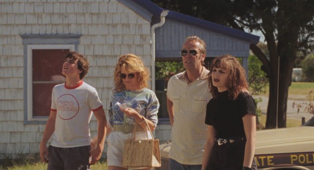 All ready for an awkward family photo, the Miracles (Marcello Conte, Lea Thompson, John Hannah, and Helena Seabrook) set their sights on their rented Ocean City summer home.