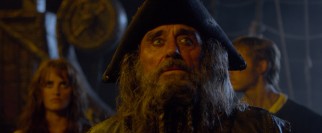 Angelica's father is Edward Teach (Ian McShane), a pirate known as Blackbeard, though the beard looks more white to me.