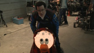 Josh Gad shows us the light-up stand-in of Q*bert.