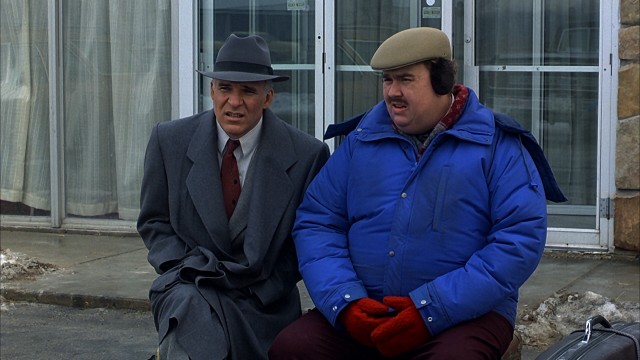 In "Planes, Trains & Automobiles", Steve Martin and John Candy play strangers bound together by circumstance and transportation challenges in an attempt to reach Chicago by Thanksgiving.