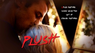 Cam Gigandet gives his short wife's blonde head a kiss on the Plush DVD main menu.