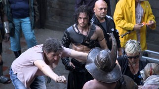 Director Paul W.S. Anderson shows Kit Harrington how to fight like a gladiator in "Pompeii: Buried in Time."
