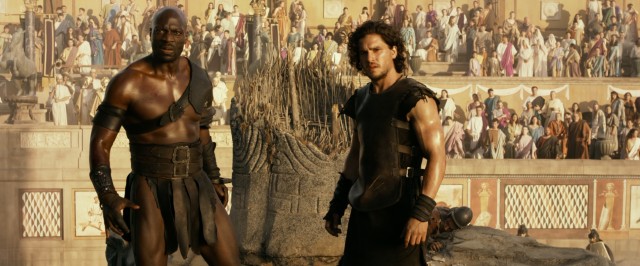 Atticus (Adewale Akinnuoye-Agbaje) and Milo (Kit Harington), two gladiators assigned to fight each other to the death, join forces against a common enemy in "Pompeii."