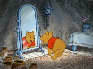 Winnie the Pooh builds up his appetite with up, down, touch the ground exercises.