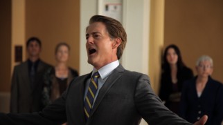 Kyle MacLachlan returns as Portland's easygoing mayor, seen here belting out the city's national anthem.