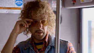 Driver Kim (Jason Sudeikis) is the lone man on a bus full of feminists in season finale "Getting Away."