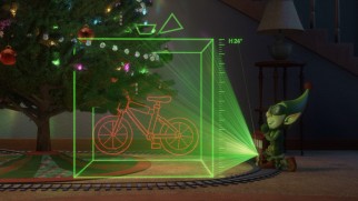 While Lanny dutifully tries to clear space under the Christmas tree for a bicycle...