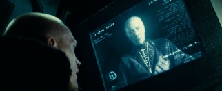 Monsignor Orelas (Christopher Plummer) hears a priest's confession virtually.