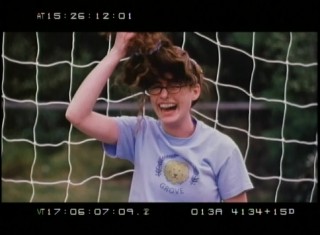 Goalkeeper Anne Hathaway does battle with "The Beast", her frizzy wig in The Princess Diaries' Outtakes and Bloopers reel.