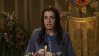 A wet and casual Mia (Anne Hathaway) makes an impromptu speech at the ball where she is to announce her future.