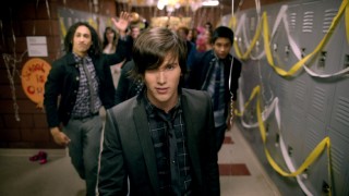 Allstar Weekend singer Zach Porter leads a vivacious walk through a high school hallway in the band's "Not Your Birthday" music video.