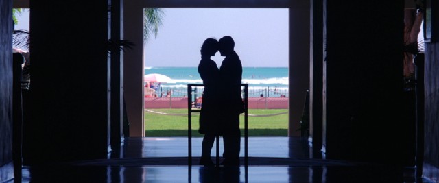 Meeting in Hawaii, Lena and Barry create one of the film's many artful images in this silhouettes in front of scenery shot that was used in the film's theatrical one-sheet.