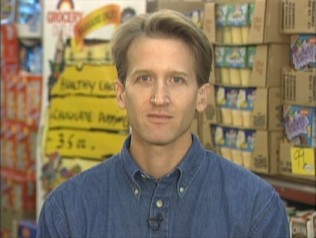 An NBC daytime interview lets David Phillips explain the Healthy Choice frequent flyer mile promotion he exploited with pudding cups.