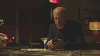 After learning of Henry Phillips, Hollywood producer Jay Warren (J.K. Simmons) promptly looks him up on his smart phone in this deleted bar scene.