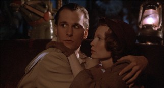 Ted (Jeff Daniels) expects a fadeout as he gets affectionate with Cecilia (Mia Farrow).