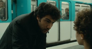 On a train platform, Samir (Tahar Rahim) tries to understand his son's lack of cooperation.