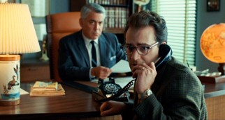 Larry (Michael Stuhlbarg) receives a troublingly trivial phone call while his divorce lawyer (Adam Arkin) is on the clock.