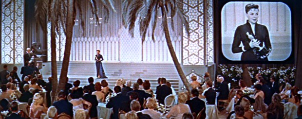 Life almost imitated art, but Judy Garland lost the Best Actress Academy Award to Grace Kelly in one of the Oscars' all-time closest races. As Vicki Lester, Garland accepts the statue onstage; winning in real life, she would have given her speech from a hospital bed.