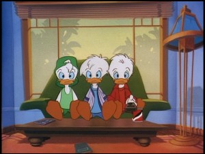 The nephews don't look too overwhelmed by whatever they're watching on TV here. Perhaps they're disheartened to find that episodes on "Quack Pack"'s debut DVD number only as much as they.