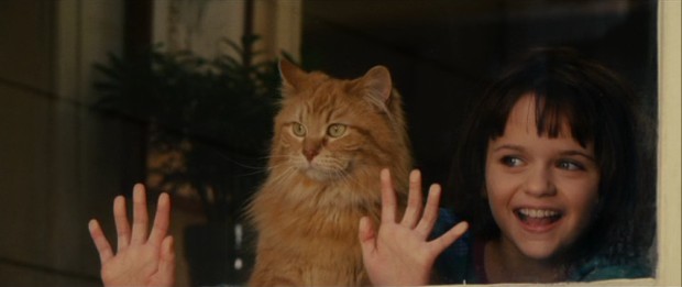 Ramona (Joey King) lets her hands move with her cat Picky Picky in "Ramona and Beezus."