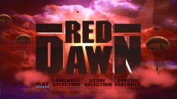 Animated paratroopers fall in front of a big Red Dawn title as Disc 1's Main Menu.
