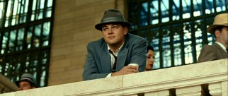 Frank (Leonardo DiCaprio) is happy to have a quiet moment away from the hatted, suited hordes making their way around Grand Central.