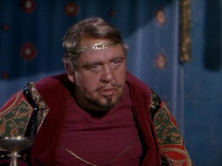 As King Herod, Charles Laughton stares at his birthday gift in "Salome."