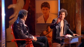 In the leather jacket and briefs look of one of the roastee's more famous photo shoots, Jeffrey Ross makes a toast to David Hasselhoff.