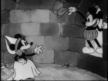Wandering minstrel Mickey pays a visit to the tower-sentenced Minnie in "Ye Olden Days", which this time around is presented in its original black and white.