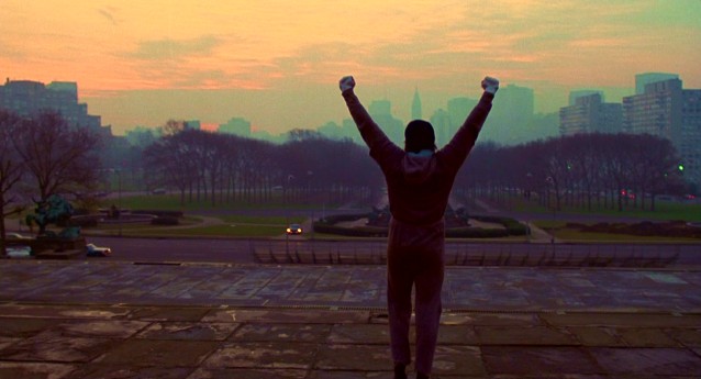 Having confidently ascended the 72 stairs outside the Philadelphia Museum of Art now commonly referred to as "the Rocky steps", Rocky Balboa throws his hands in the air triumphantly in this shot from the film's iconic training montage.