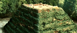 The eponymous temple ruins where much of the movie takes place are largely green, steeply inclined, and like an unfinished pyramid.