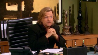 David Spade plays the rich, single, and shameless Russell Dunbar.