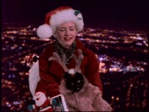 Sabrina fills in for Jolly Old St. Nick (played by John Ratzenberger) in the Christmas episode "Sabrina Claus."