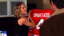 Samantha admires her new customized Blackhawks jersey in "The Hockey Date."