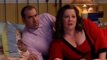 The attentions of Mr. Coleman (Gary Hoffman) and Dena are seized by a TV interview with the woman who brought them together (Samantha).
