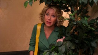 No, Nancy Drew hasn't grown up. That's just Samantha Who, hiding behind a plant to be Todd's affair.