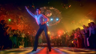 To applause, disco music, and all sorts of colored lights, Tony shows why he's king of the 2001 Odyssey dance floor.