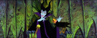 Maleficent sits wickedly while chatting with her pet raven Diablo.