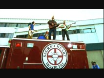 Lazlo Bane performs "Superman" in their music video.