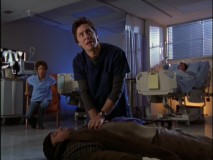 In an effort to improve his first date with Kylie (Chrystee Pharris, background), J.D. pays Homeless Steve (Christopher Darga) to fake a heart attack in "My Quarantine."