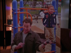 Dr. Cox's proud playground antics put him in a compromising position when this enlarged photograph gets sent to Jordan.