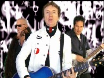 British pop rocker G Tom Mac appears (with two shady-looking companions) in the music video "Half."