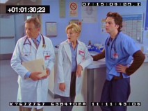 Dr. Kelso, Kim, and J.D. look towards disaster in a deleted scene involving Doug, a corpse, and an unstable floor/ceiling.